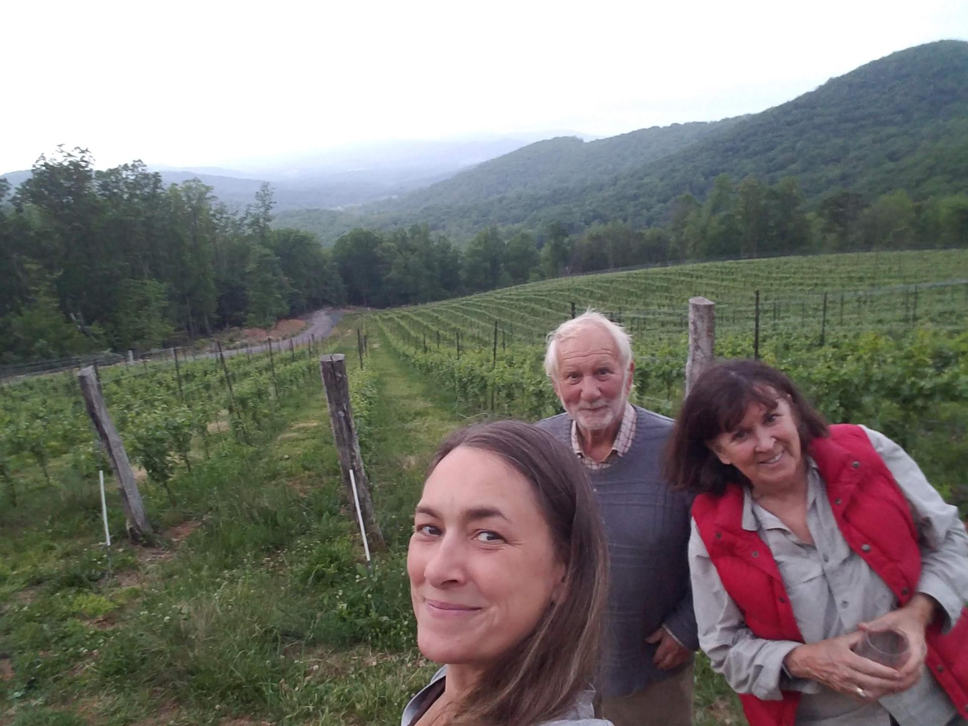 Tamara with her parents in the vineyard